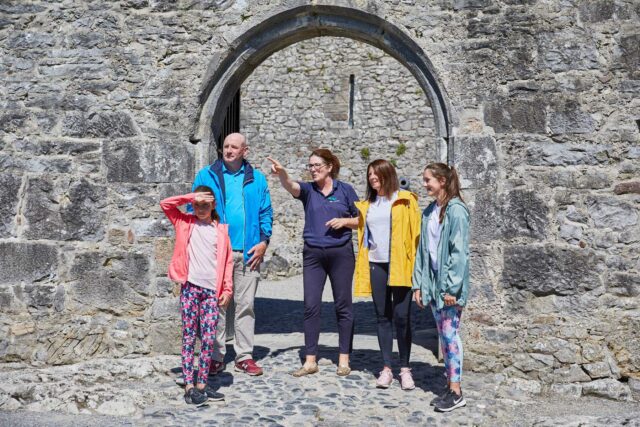 a family get a guided tour