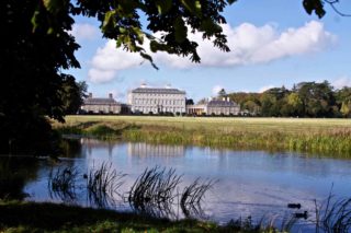 View of Castletown from the meadow and the lake
