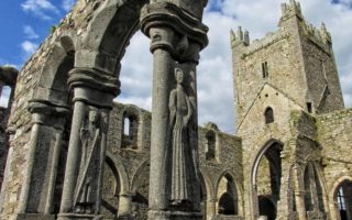 Human figures carved into the columns in the Cloister at Jerpoint Abbey