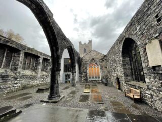 An interior view of St Audoen's Church Visitor Centre, featuring the Portlester Chapel ruins