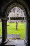 view through the cloisters to the graveyard