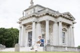 Woman reads outside Casino Marino