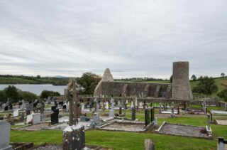 Drumlane Abbey with the shore of Garfinny Lough on the left.