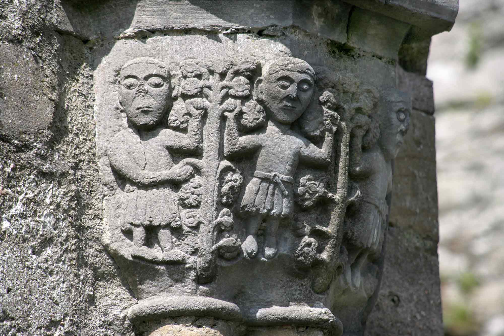 Pier capital, south arcade of the nave – human figures with trees