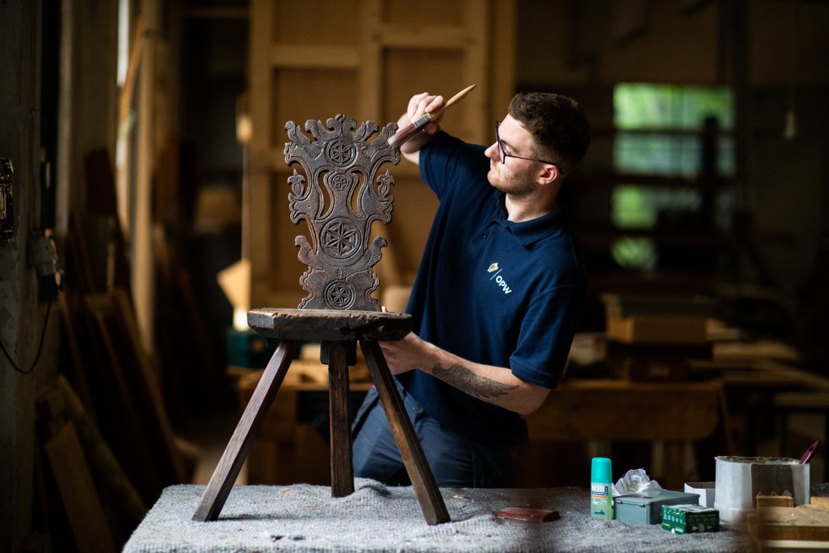 The picture shows apprentice Dylan Treacher, from the OPW Furniture Division,which has been running an apprenticeship programme for almost 50 years, preserving and passing on core values of traditional conservation and restoration methods, working on a Garnish Island chair from the 17th Century.