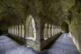 The cloisters of Quin - an angled view of two corridors within the cloisters