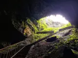 the stairs leading down into the cave