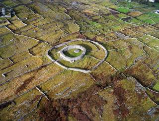 aerial view of the ringfort, which looks like 2 forts circling around each other