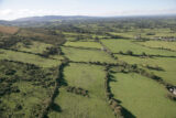 aerial view of a field landscape, the land demarcated into separate fields