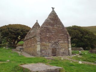 the church standing within the graveyard