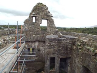 view from interior of the castle, which has scaffold for ongoing conservation.