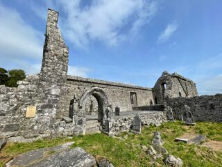 the stone walls and surrounding gravestones at Killone Abbey