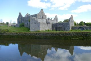 a close-up of the friary across the river