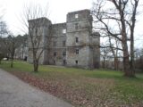 view towards the front of Kanturk Castle. The front has two 5 storey towers on either side of the main 4 storey house.