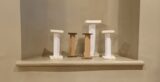 paper columns standing within an alcove