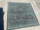 Commeroration Plaque including text: In honour of all those men and women who died in the past wars or on Service with the United Nations.