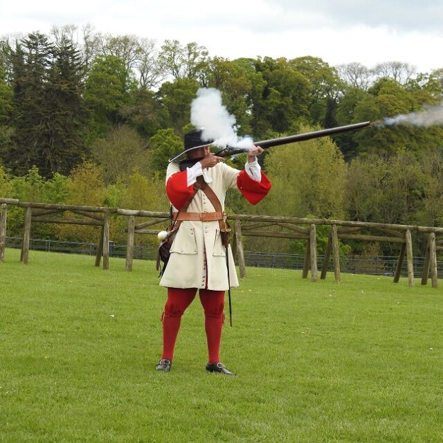 Musketeer in action at history shooting display