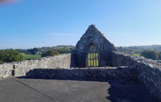 view of interior grounds of the roofless church
