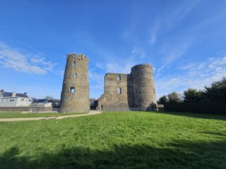 Image of Ferns Castle as it stands today under a bright blue sky