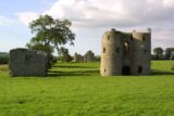 The ruins of two small buildings side by side