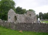 church ruins within a low walled enclosure