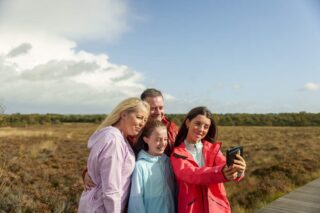 a family pose for a picture together
