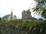 view of the castle behind houses