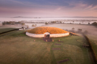 the tomb at newgrange shrouded in mist