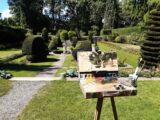 Art Easel in front of garden