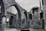 view of the outer courtyard and arches of the church