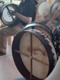 Image of bodhrans being played