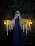 A ghost doll holds lanterns.