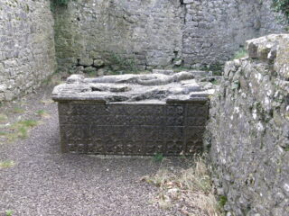 the decorated stone tomb