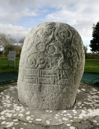 detailed carvings on a rounded stone