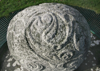 up-close on the decorations of the Turoe Stone