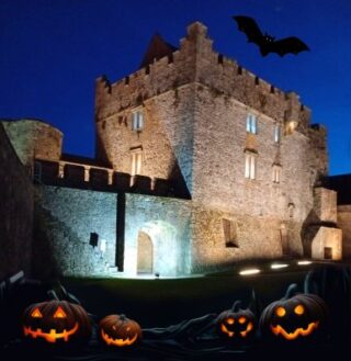 Cahir Castle with pumpkins outside.