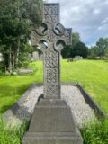 Image of a cross shaped Graves Headstone