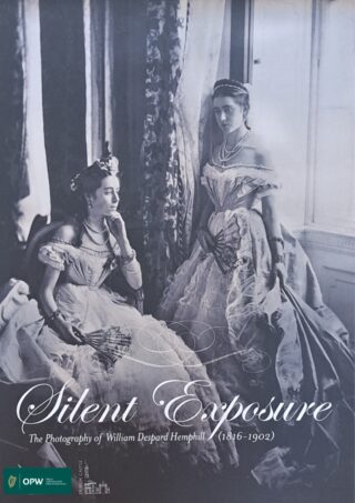 A black and white image of 2 ladies during the 19th Century - a lady stands by a window facing anothe seated lady