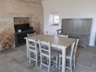 table and chairs on display in a dining room setting