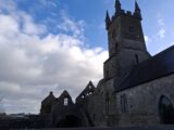 external image of a church with tower protruding toward the sky