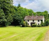 A Cottage in a parkland
