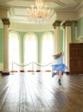 A girl near a large Window