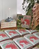 image of a woman holding a book and the books shown in a row in the foreground